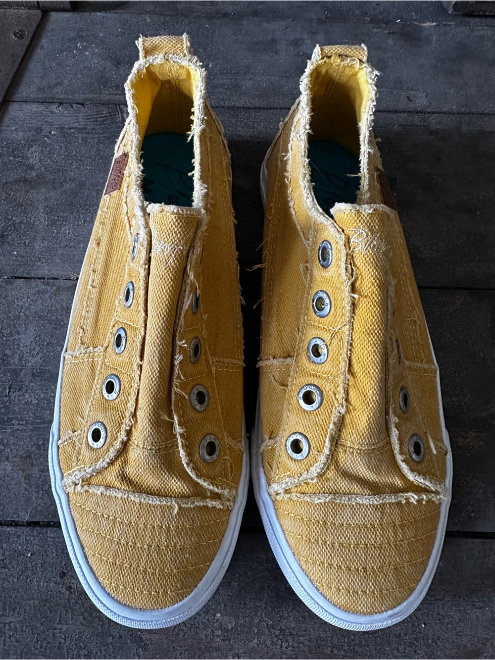 Malibu Blowfish Womenโs Yellow Slip-On Canvas Sneakers with Frayed Trim